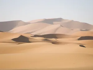 desert under blue sky during daytime jigsaw puzzle