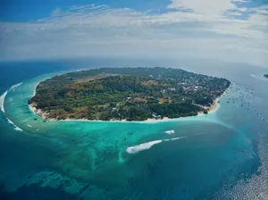 green and brown island under blue sky during daytime jigsaw puzzle