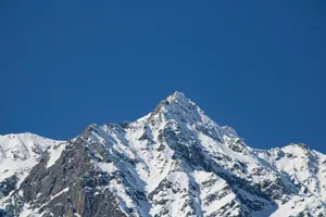 snow covered mountain under blue sky during daytime jigsaw puzzle