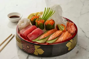a close up of a bowl of food with chopsticks jigsaw puzzle