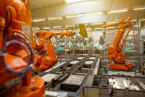 a factory filled with lots of orange machines jigsaw puzzle