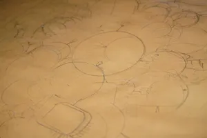 Faint abstract pencil sketches on brown paper jigsaw puzzle
