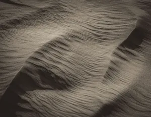 Close-up of wavy sand dunes showcasing unique textures in Dubai's desert. jigsaw puzzle