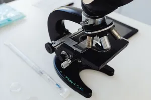 Detailed photo of a microscope on a laboratory desk, symbolizing scientific research. jigsaw puzzle