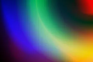 An artistic abstract background with a spectrum of vibrant colors forming a fluid gradient. jigsaw puzzle