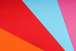 Vibrant geometric pattern with colorful paper sheets forming an abstract background. jigsaw puzzle