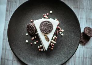 a piece of cake on a black plate jigsaw puzzle