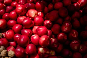 A large pile of vibrant red apples. jigsaw puzzle