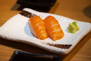 Salmon nigiri sushi presented with wasabi. jigsaw puzzle