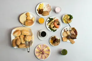 sliced bread with sliced lemon and green vegetable on white ceramic plate jigsaw puzzle