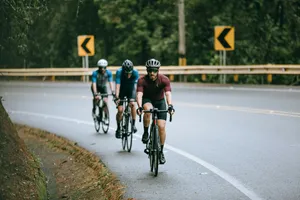 men riding bicycle on road during daytime jigsaw puzzle