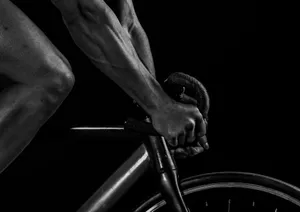 grayscale photography of man riding bicycle jigsaw puzzle