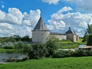 a castle with a pond in front of it jigsaw puzzle