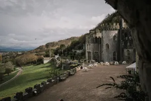 a castle with a lot of tables and chairs in front of it jigsaw puzzle