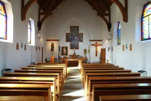 brown wooden church bench inside church jigsaw puzzle
