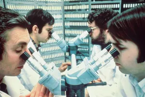 2 men in white and blue uniform holding blue and white plastic toy jigsaw puzzle