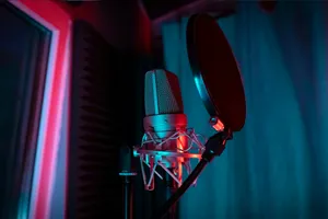 a microphone with a red light shining on it jigsaw puzzle