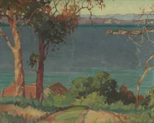Trees line a path leading to a calm blue bay. jigsaw puzzle