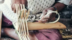 a person cutting wood jigsaw puzzle