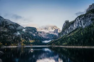 A serene view of Gosausee with Dachstein mountains in Upper Austria during autumn. jigsaw puzzle