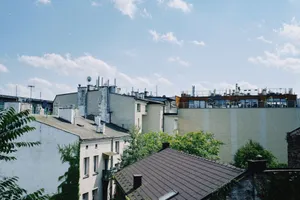 A picturesque view of Kraków's residential rooftops on a bright and sunny day. jigsaw puzzle