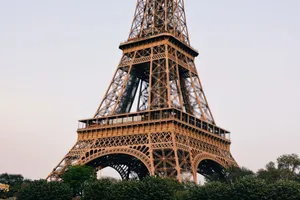 The Eiffel Tower's iconic structure in Paris captured on a clear day, showcasing its impressive iron lattice design. jigsaw puzzle