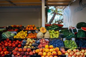 Vibrant variety of fresh fruits at an outdoor stand, perfect for a healthy diet. jigsaw puzzle