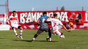Exciting soccer game moment with players in action on a sunny day outdoors. jigsaw puzzle