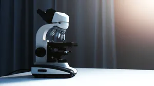 Close-up of a modern microscope in a laboratory with soft lighting. jigsaw puzzle