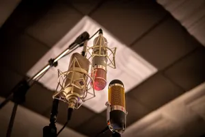 Three condenser microphones arranged for optimal sound capture in a recording studio. jigsaw puzzle
