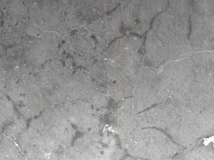Detailed close-up of a cracked and textured concrete surface, ideal for backgrounds. jigsaw puzzle
