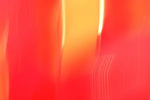 Dynamic abstract image featuring vibrant red and orange light streaks creating an artistic and modern aesthetic. jigsaw puzzle
