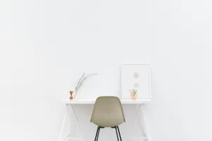 white wooden table near brown chair jigsaw puzzle