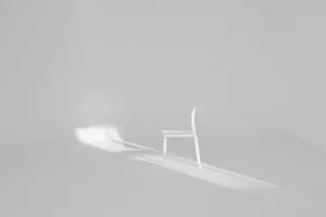 white chair on white surface jigsaw puzzle