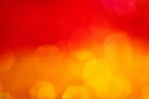 a blurry image of a red and yellow background jigsaw puzzle