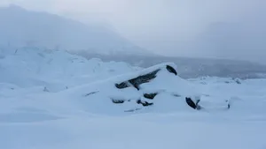 a pile of snow sitting on top of a snow covered ground jigsaw puzzle