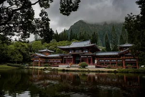 gray and brown pagoda temple beside calm body of water at daytime jigsaw puzzle