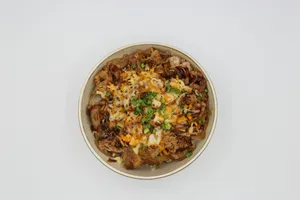 a bowl of food on a white table jigsaw puzzle