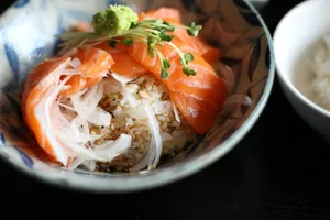 Salmon sashimi bowl with rice and garnishes jigsaw puzzle