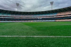 a sports stadium with a field jigsaw puzzle