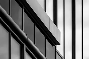 a black and white photo of a tall building jigsaw puzzle