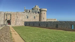 a stone castle with a grass lawn jigsaw puzzle