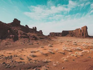 Explore a breathtaking Algerian desert with dramatic rock formations and clear blue skies. jigsaw puzzle