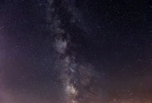 A stunning night sky view showcasing the Milky Way and countless stars, ideal for astronomy enthusiasts. jigsaw puzzle