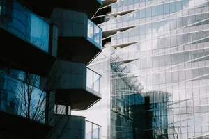 Glass and concrete urban architecture with sky reflections on modern buildings. jigsaw puzzle