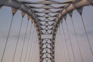 Futuristic steel bridge captured from below, showcasing geometric design. jigsaw puzzle