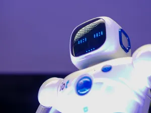 A modern humanoid robot with digital face and luminescent screen, symbolizing innovation in technology. jigsaw puzzle