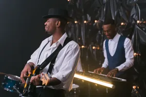 Energetic performance by jazz musicians with guitar and piano, creating soulful entertainment. jigsaw puzzle