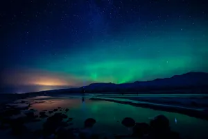 aurora borealis photography of body of water and mountain jigsaw puzzle