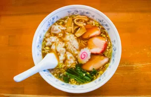 a bowl of soup with a spoon in it jigsaw puzzle